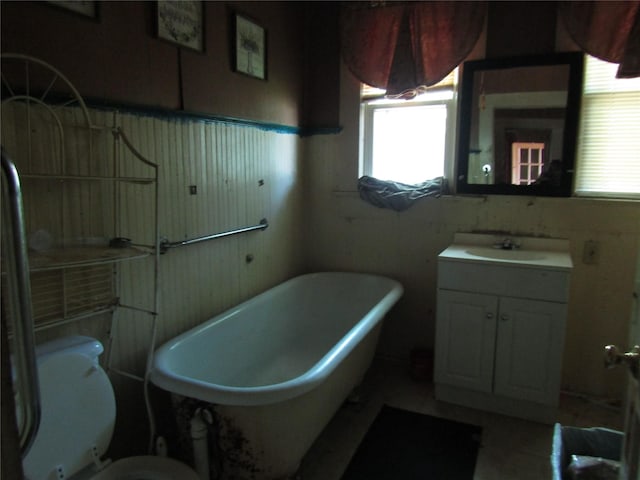 507 N Beaton St, Corsicana, TX 75110 - full bath featuring a freestanding bath, vanity, toilet, and tile patterned floors