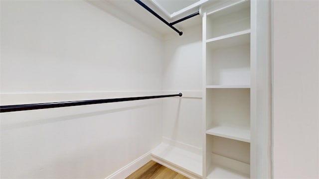 2210 Mcclure St, Irving, TX 75062 - walk in closet with light wood-style floors
