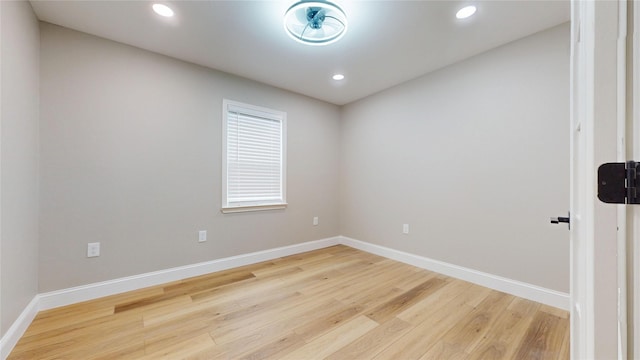 2210 Mcclure St, Irving, TX 75062 - unfurnished room featuring light wood-type flooring, baseboards, and recessed lighting