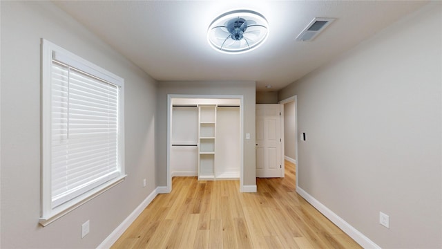 2210 Mcclure St, Irving, TX 75062 - unfurnished bedroom with light wood-type flooring, baseboards, and a closet
