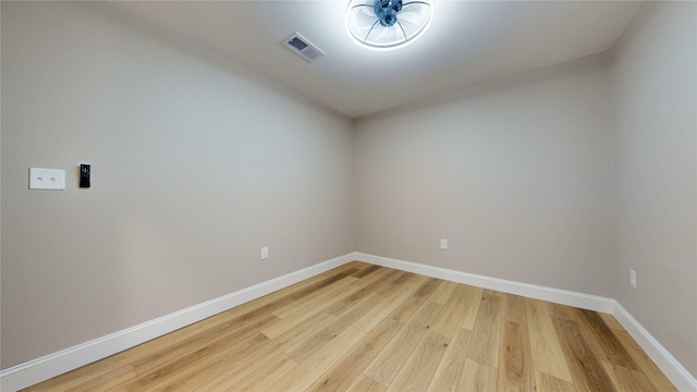 2210 Mcclure St, Irving, TX 75062 - spare room with light wood-style floors and baseboards