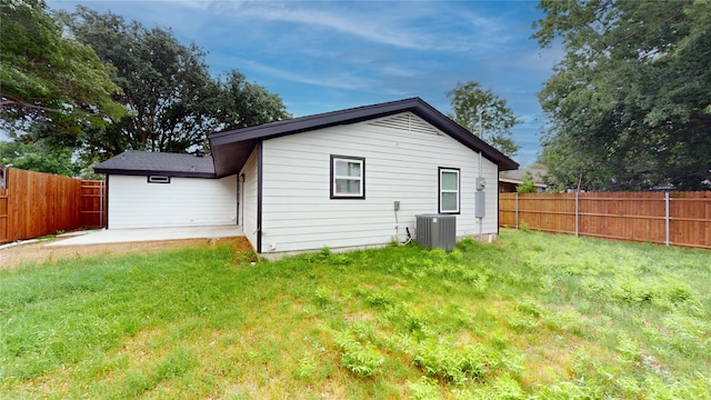 2210 Mcclure St, Irving, TX 75062 - rear view of property with cooling unit and a patio