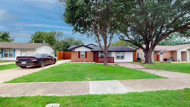 2210 Mcclure St, Irving, TX 75062 - ranch-style house featuring driveway