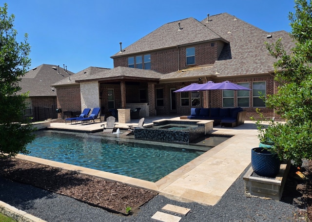 817 Calm Crest Dr, Rockwall, TX 75087 - view of swimming pool with a patio area, an outdoor hangout area, and a pool with connected hot tub
