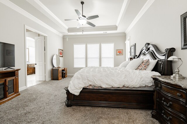 817 Calm Crest Dr, Rockwall, TX 75087 - carpeted bedroom with a raised ceiling, crown molding, ceiling fan, ensuite bath, and baseboards
