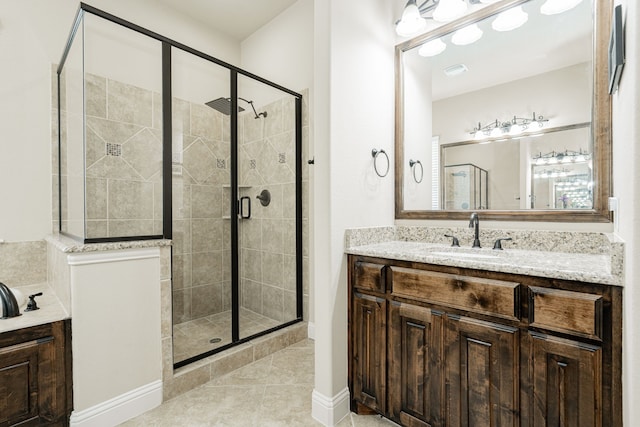 817 Calm Crest Dr, Rockwall, TX 75087 - bathroom featuring a stall shower, vanity, and tile patterned flooring