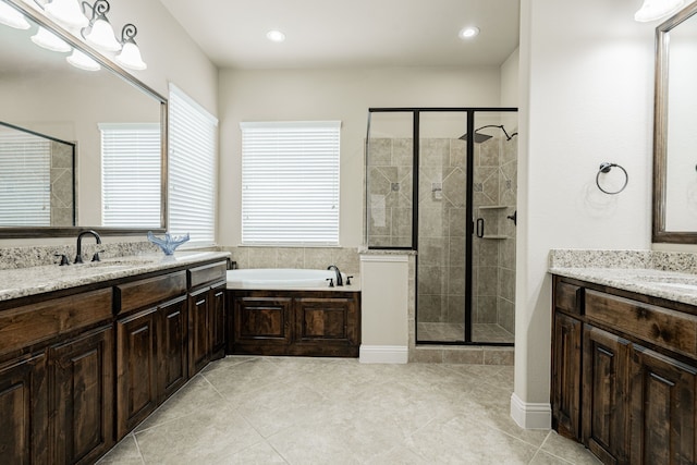 817 Calm Crest Dr, Rockwall, TX 75087 - full bath featuring a shower stall, two vanities, tile patterned floors, and recessed lighting