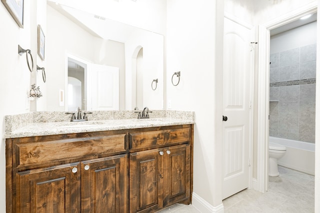 817 Calm Crest Dr, Rockwall, TX 75087 - bathroom with double vanity, toilet, tile patterned floors, bathtub / shower combination, and baseboards