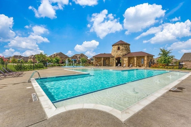 817 Calm Crest Dr, Rockwall, TX 75087 - community pool with a patio area and a residential view