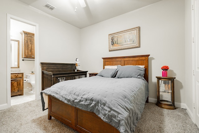 817 Calm Crest Dr, Rockwall, TX 75087 - bedroom featuring light carpet, baseboards, and ensuite bathroom