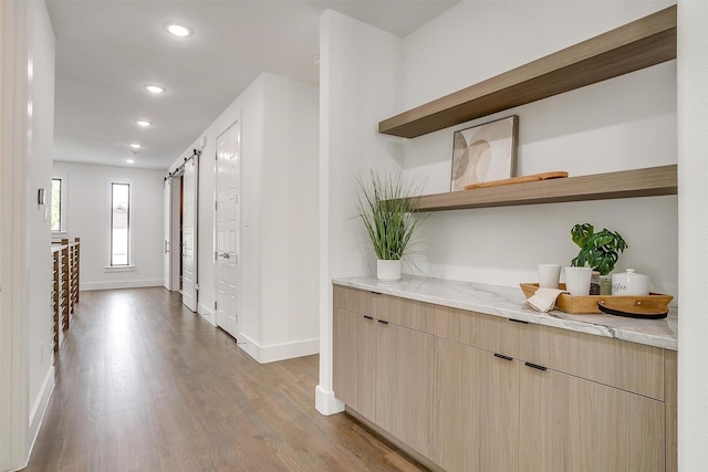3916 W 5th St, Fort Worth, TX 76107 - hall with baseboards, wood finished floors, and recessed lighting