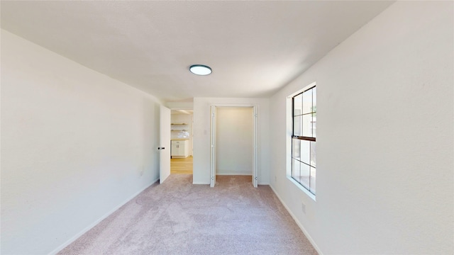 3809 Grover Ave, Fort Worth, TX 76106 - unfurnished bedroom with light colored carpet and baseboards