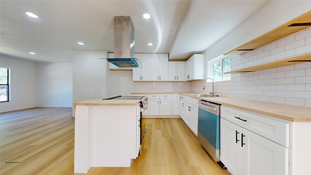 3809 Grover Ave, Fort Worth, TX 76106 - kitchen featuring a sink, island range hood, dishwasher, open shelves, and wooden counters