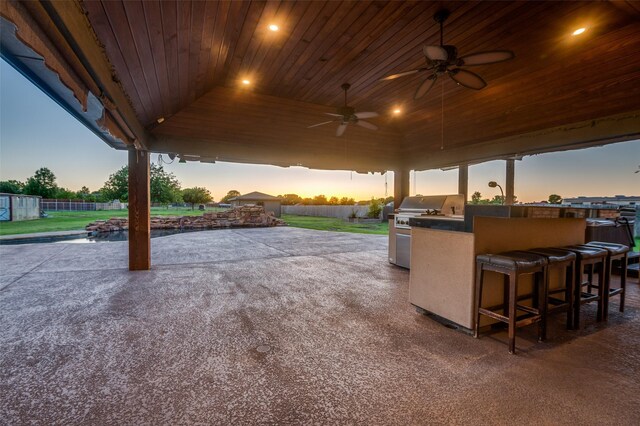 10260 E Rancho Diego Ln, Crowley, TX 76036 - patio terrace at dusk with a patio and ceiling fan