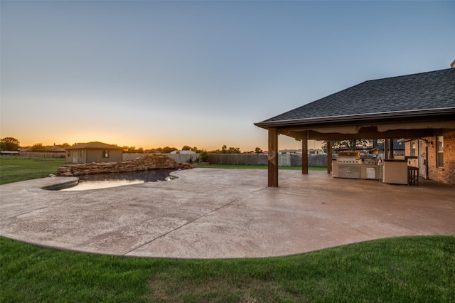10260 E Rancho Diego Ln, Crowley, TX 76036 - patio terrace at dusk with a patio area