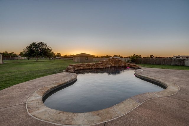 10260 E Rancho Diego Ln, Crowley, TX 76036 - pool at dusk with a patio area