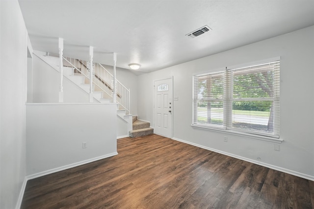 2913 Portales Dr, Fort Worth, TX 76116 - entryway with wood finished floors, baseboards, and stairway