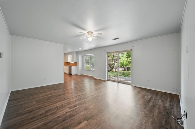 2913 Portales Dr, Fort Worth, TX 76116 - unfurnished living room featuring a ceiling fan, dark wood-type flooring, and baseboards
