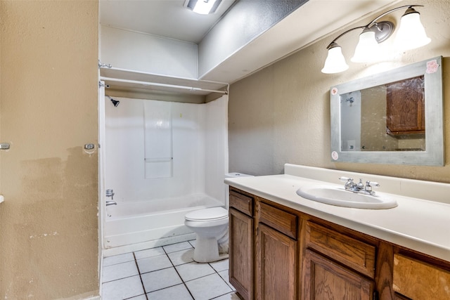 711 W State St, Terrell, TX 75160 - bathroom with toilet, tile patterned flooring, vanity,  shower combination, and a textured wall