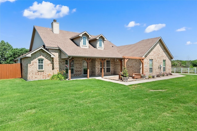 1000 Macadamia St, Venus, TX 76084 - back of property featuring brick siding, a shingled roof, a chimney, and a patio area