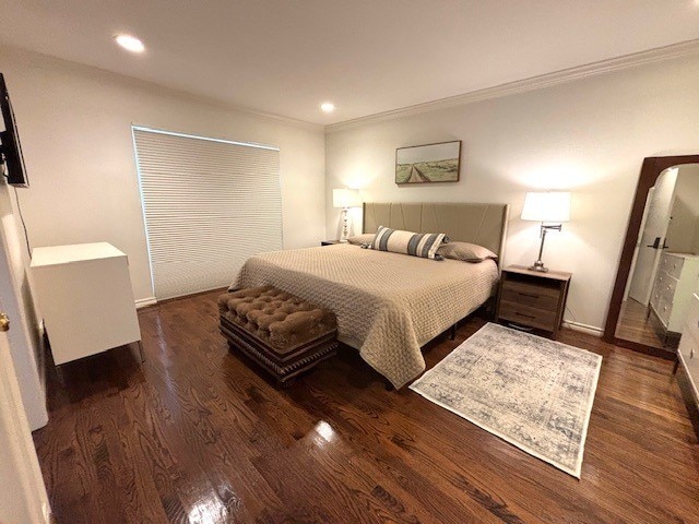 6112 Averill Way Unit B, Dallas, TX 75225 - bedroom with crown molding, wood finished floors, recessed lighting, and baseboards