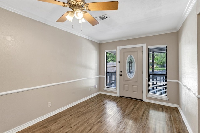 616 Bellevue Dr, Cleburne, TX 76033 - entrance foyer with wood finished floors, baseboards, crown molding, and a ceiling fan