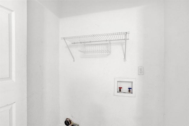 10533 Solta Dr, Dallas, TX 75218 - laundry room featuring hookup for a washing machine
