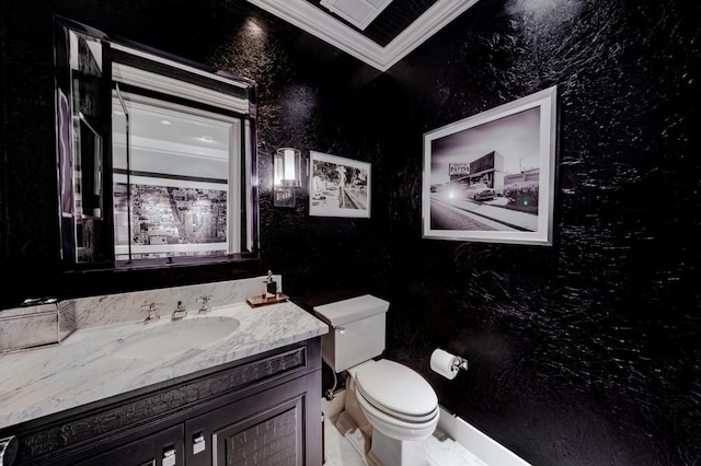 2525 N Pearl St Unit 1704, Dallas, TX 75201 - bathroom with ornamental molding, vanity, and toilet