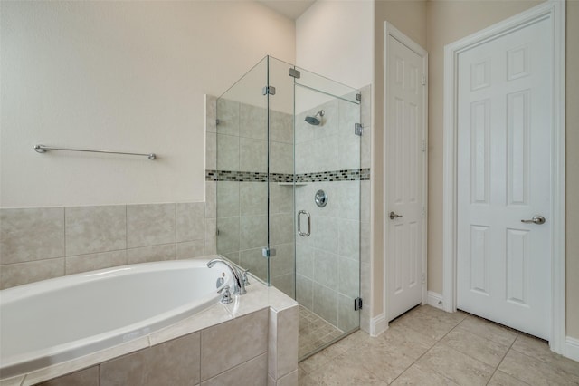 3608 Walden Dr, Mckinney, TX 75071 - full bath featuring a bath, a stall shower, and tile patterned floors