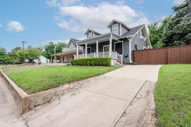 715 S Barnett Ave, Dallas, TX 75211 - view of front facade featuring a porch and driveway