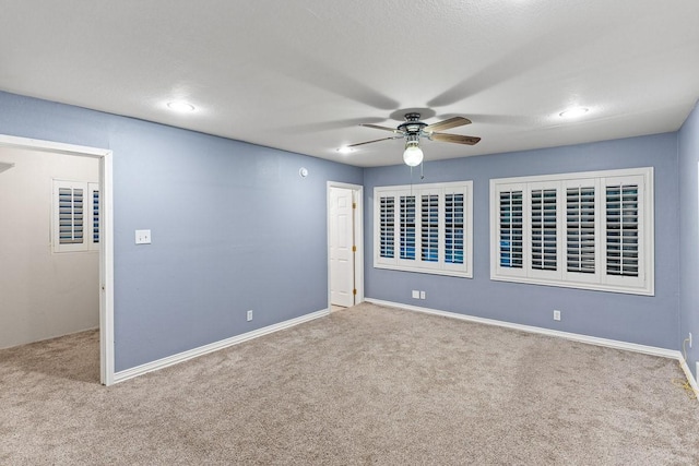 715 S Barnett Ave, Dallas, TX 75211 - carpeted empty room featuring a ceiling fan and baseboards