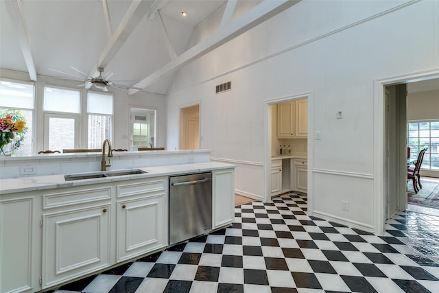 5865 Farquhar Ln, Dallas, TX 75209 - kitchen featuring stainless steel dishwasher, a sink, a ceiling fan, beam ceiling, and high vaulted ceiling