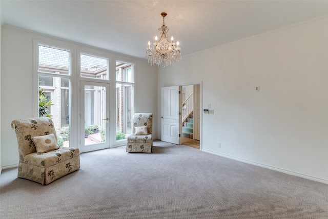 5865 Farquhar Ln, Dallas, TX 75209 - living area featuring carpet, a chandelier, stairs, and baseboards