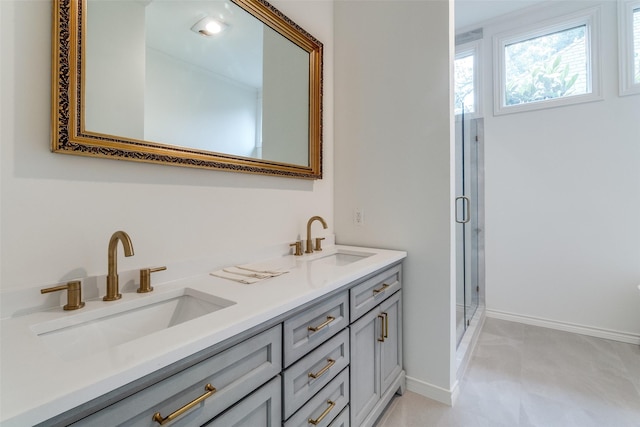 5865 Farquhar Ln, Dallas, TX 75209 - bathroom featuring double vanity, a stall shower, and baseboards