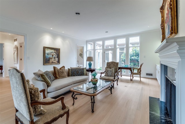 5865 Farquhar Ln, Dallas, TX 75209 - living room with crown molding, a fireplace with flush hearth, light wood finished floors, and recessed lighting