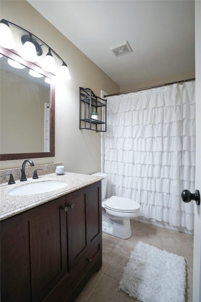5133 Sunscape Ln S, Fort Worth, TX 76123 - full bathroom with vanity, toilet, tile patterned floors, and a shower with curtain