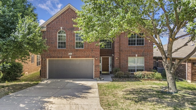 4953 Sunset Ridge Dr, Fort Worth, TX 76123 - view of front facade with concrete driveway, a garage, and brick siding