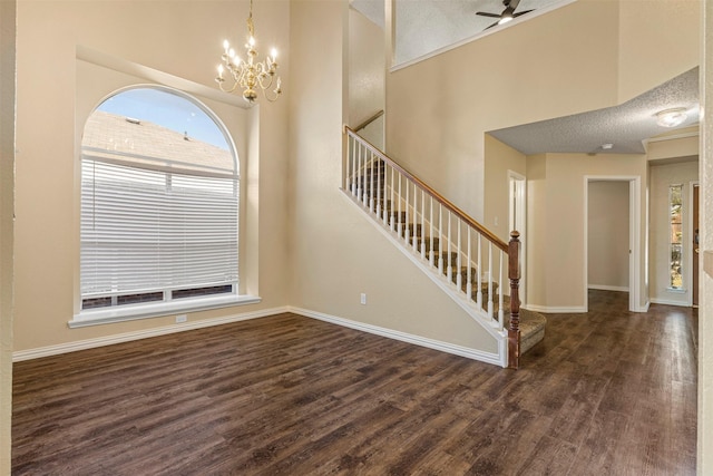 4953 Sunset Ridge Dr, Fort Worth, TX 76123 - entryway with healthy amount of natural light, wood finished floors, a chandelier, and stairs