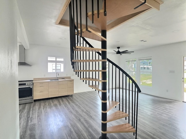 5117 Libbey Ave, Fort Worth, TX 76107 - stairway featuring wood finished floors, plenty of natural light, a ceiling fan, and baseboards