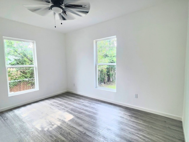 5117 Libbey Ave, Fort Worth, TX 76107 - unfurnished room featuring wood finished floors, a ceiling fan, and baseboards