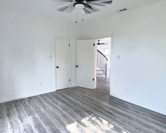 5117 Libbey Ave, Fort Worth, TX 76107 - spare room featuring ceiling fan, wood finished floors, and baseboards