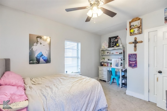 426 Brown Ave, Tuscola, TX 79562 - bedroom with light carpet, a ceiling fan, and baseboards