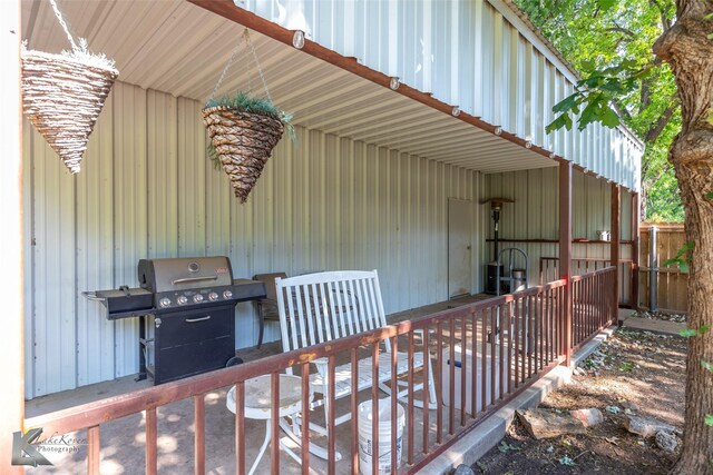 426 Brown Ave, Tuscola, TX 79562 - view of patio with a grill and a deck