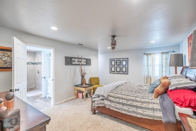 426 Brown Ave, Tuscola, TX 79562 - carpeted bedroom with recessed lighting, connected bathroom, and baseboards
