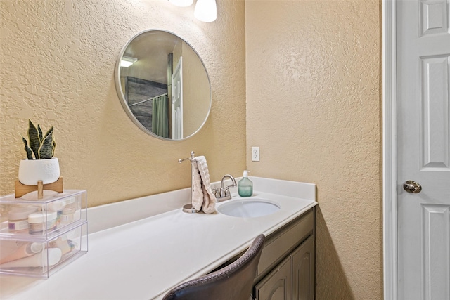 3701 Nocona Dr, Granbury, TX 76049 - bathroom with a textured wall and vanity