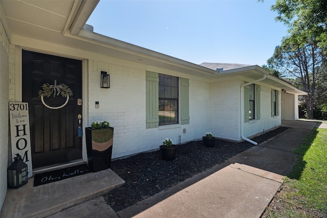3701 Nocona Dr, Granbury, TX 76049 - doorway to property featuring brick siding