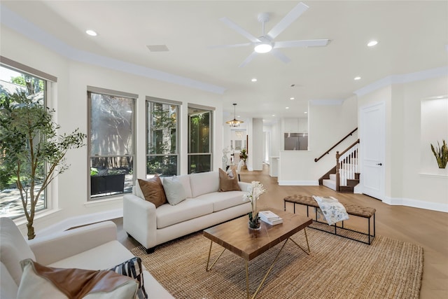 6628 Castle Pines Dr, Plano, TX 75093 - living room featuring stairway, a ceiling fan, recessed lighting, light wood-type flooring, and baseboards
