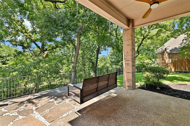 6628 Castle Pines Dr, Plano, TX 75093 - view of patio / terrace with ceiling fan, an outdoor hangout area, and view of wooded area