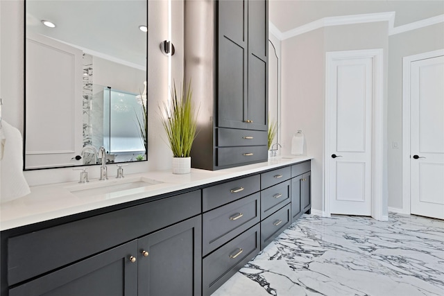 6628 Castle Pines Dr, Plano, TX 75093 - bathroom featuring ornamental molding, double vanity, marble finish flooring, and baseboards