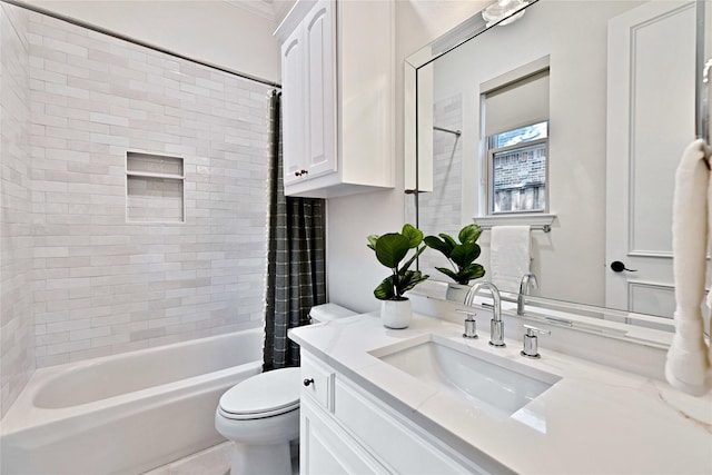 6628 Castle Pines Dr, Plano, TX 75093 - bathroom featuring vanity, toilet, shower / bathtub combination with curtain, and crown molding